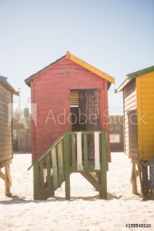 Bild på Beach huts on sand
